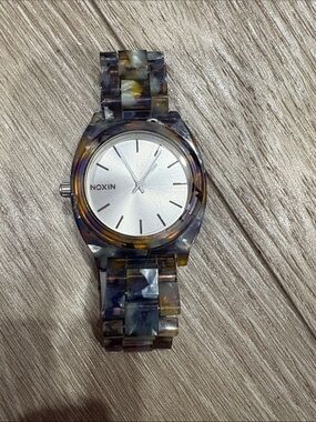 Nixon Tortoiseshell Resin Watch with Silver Dial